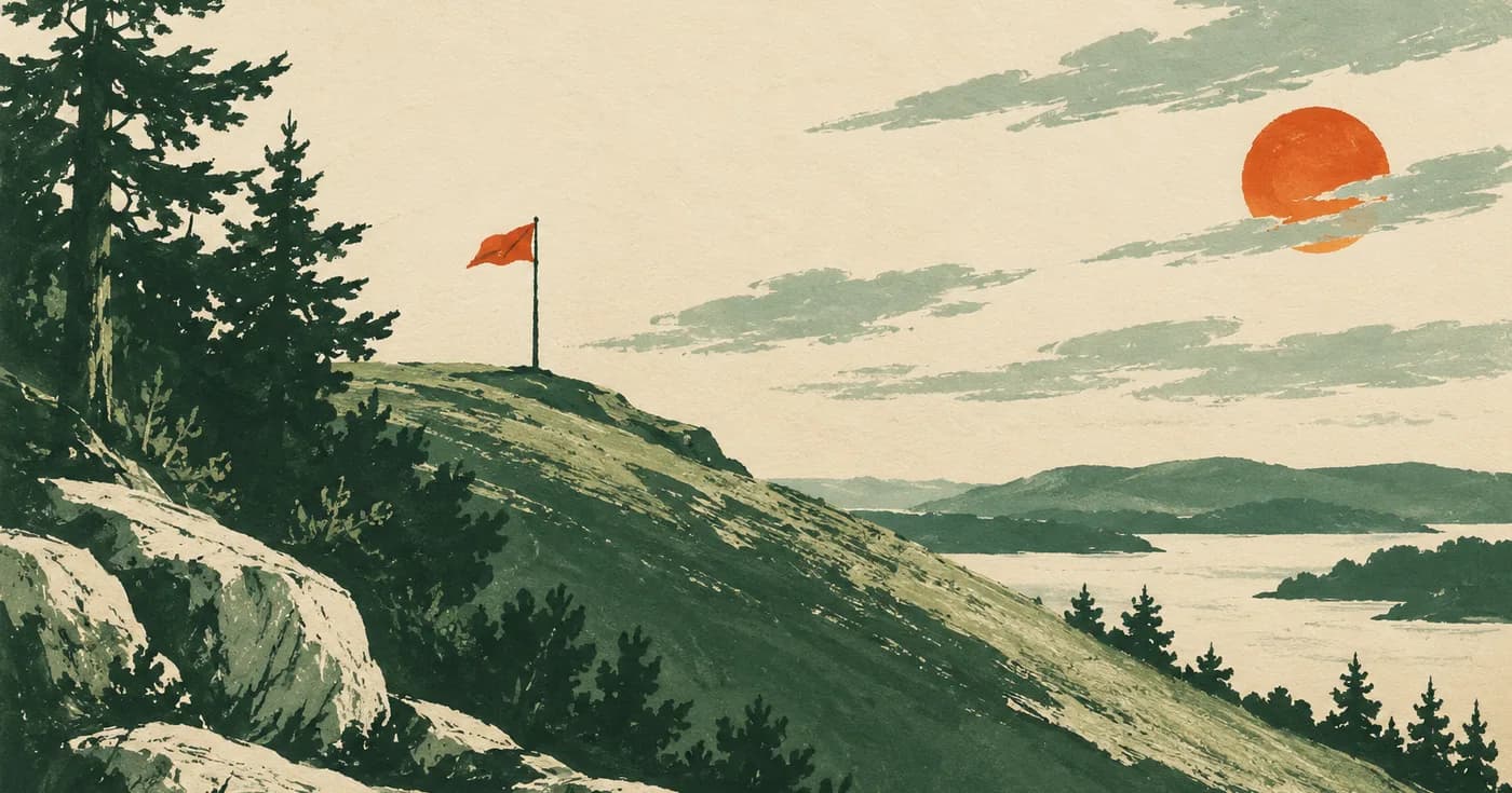a lone flag peeking above a sloping ridge